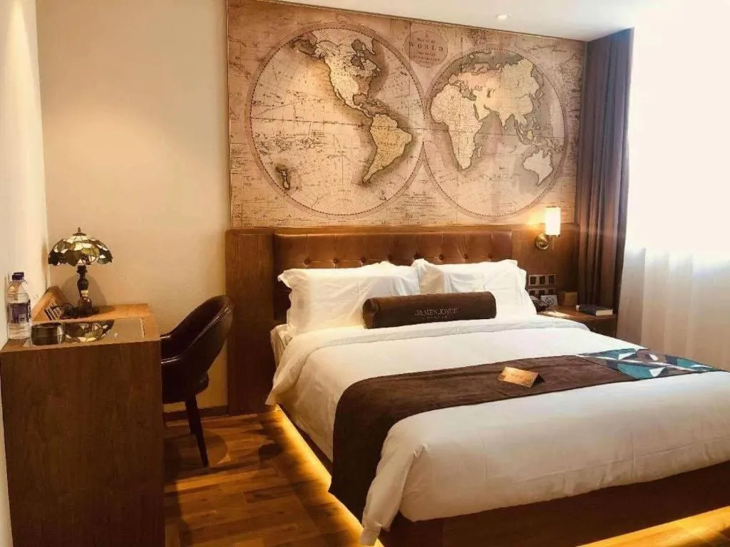 Bed in James Joyce Coffetel Shenyang North Railway Station Qishan Road Metro Station