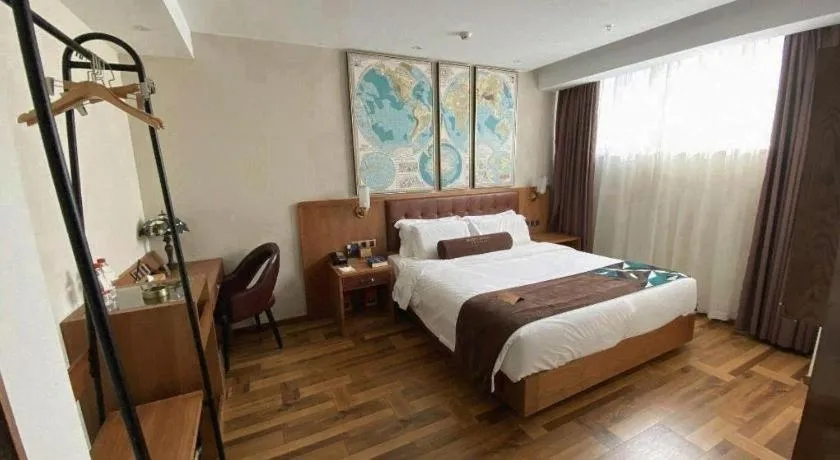 Bed in James Joyce Coffetel Shenyang North Railway Station Qishan Road Metro Station