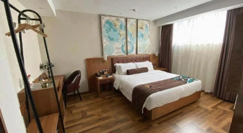 Bed in James Joyce Coffetel Shenyang North Railway Station Qishan Road Metro Station