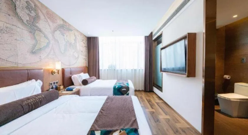 Bed in James Joyce Coffetel Shenyang North Railway Station Qishan Road Metro Station