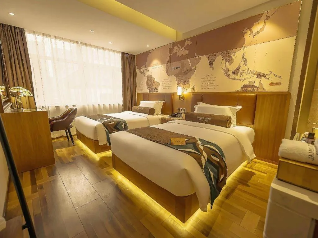 Bed in James Joyce Coffetel Shenyang North Railway Station Qishan Road Metro Station