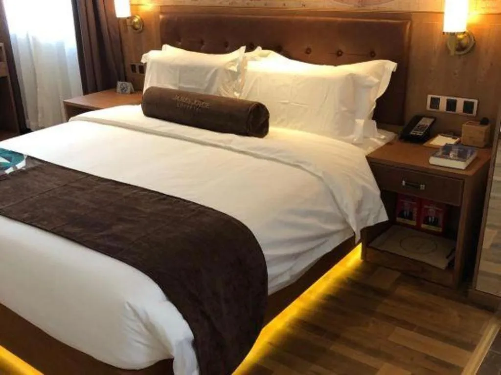 Bed in James Joyce Coffetel Shenyang North Railway Station Qishan Road Metro Station