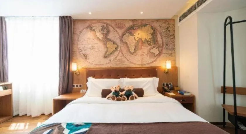 Bed in James Joyce Coffetel Shenyang North Railway Station Qishan Road Metro Station