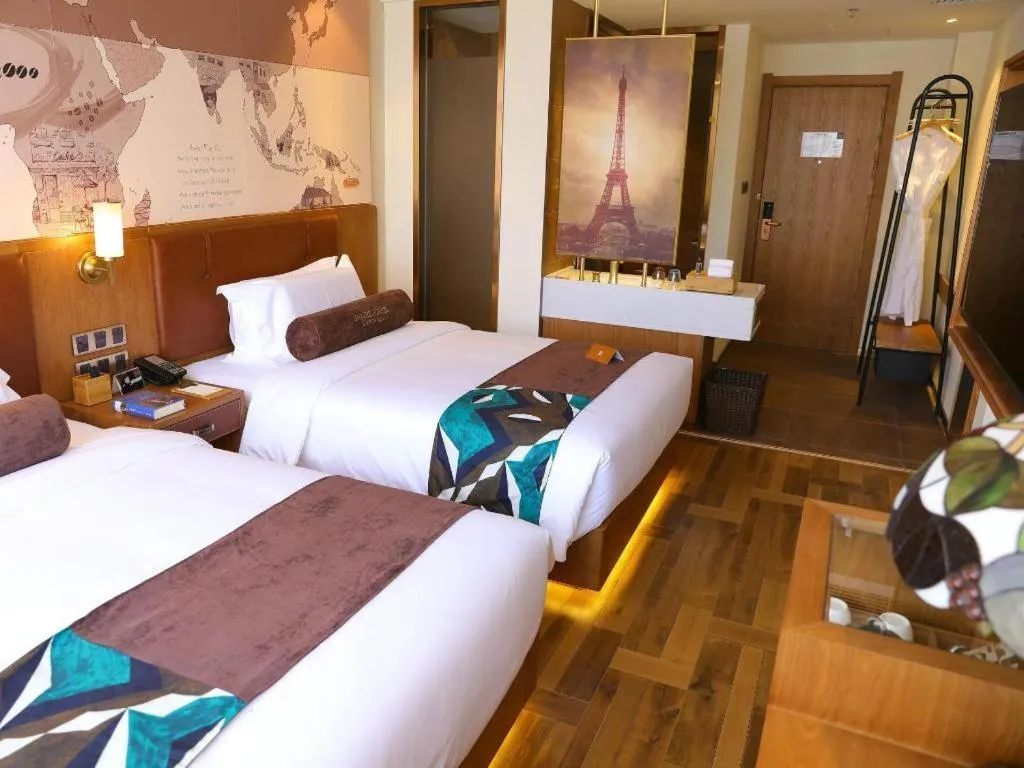 Bed in James Joyce Coffetel Shenyang North Railway Station Qishan Road Metro Station