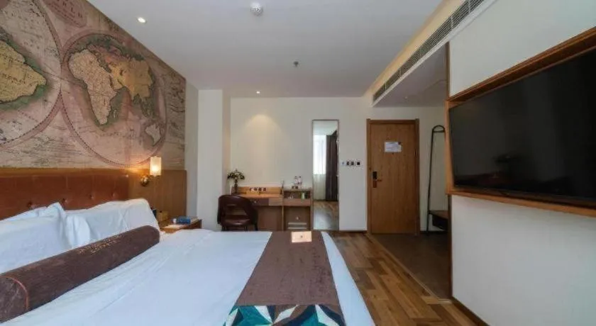 Bed in James Joyce Coffetel Shenyang North Railway Station Qishan Road Metro Station