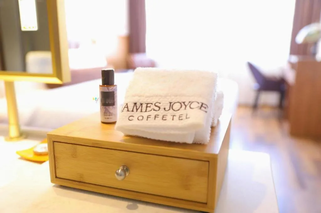 Bed in James Joyce Coffetel Shenyang North Railway Station Qishan Road Metro Station