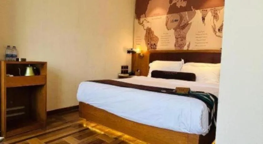 Bed in James Joyce Coffetel Shenyang North Railway Station Qishan Road Metro Station