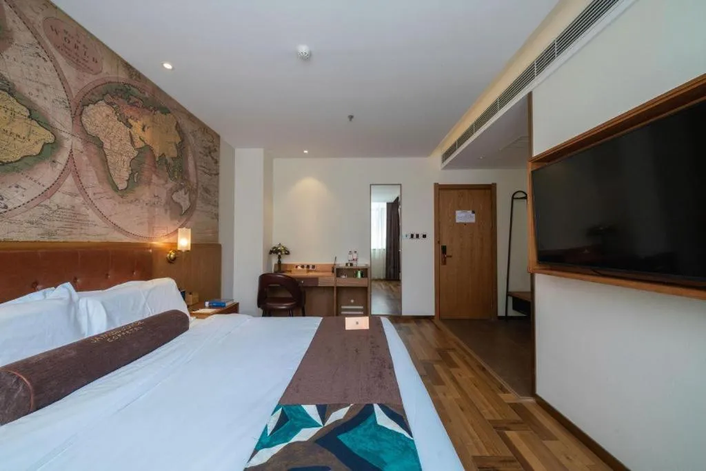 Bed in James Joyce Coffetel Shenyang North Railway Station Qishan Road Metro Station