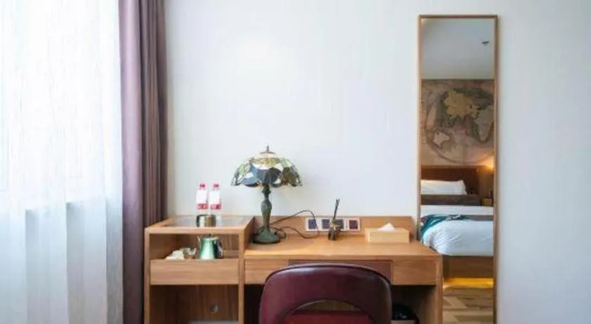 Bed in James Joyce Coffetel Shenyang North Railway Station Qishan Road Metro Station