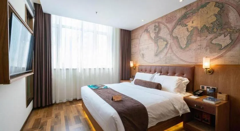 Bed in James Joyce Coffetel Shenyang North Railway Station Qishan Road Metro Station