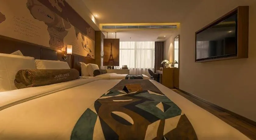 Bed in James Joyce Coffetel Shenyang North Railway Station Qishan Road Metro Station