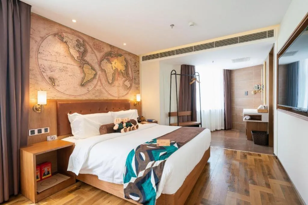 Bed in James Joyce Coffetel Shenyang North Railway Station Qishan Road Metro Station