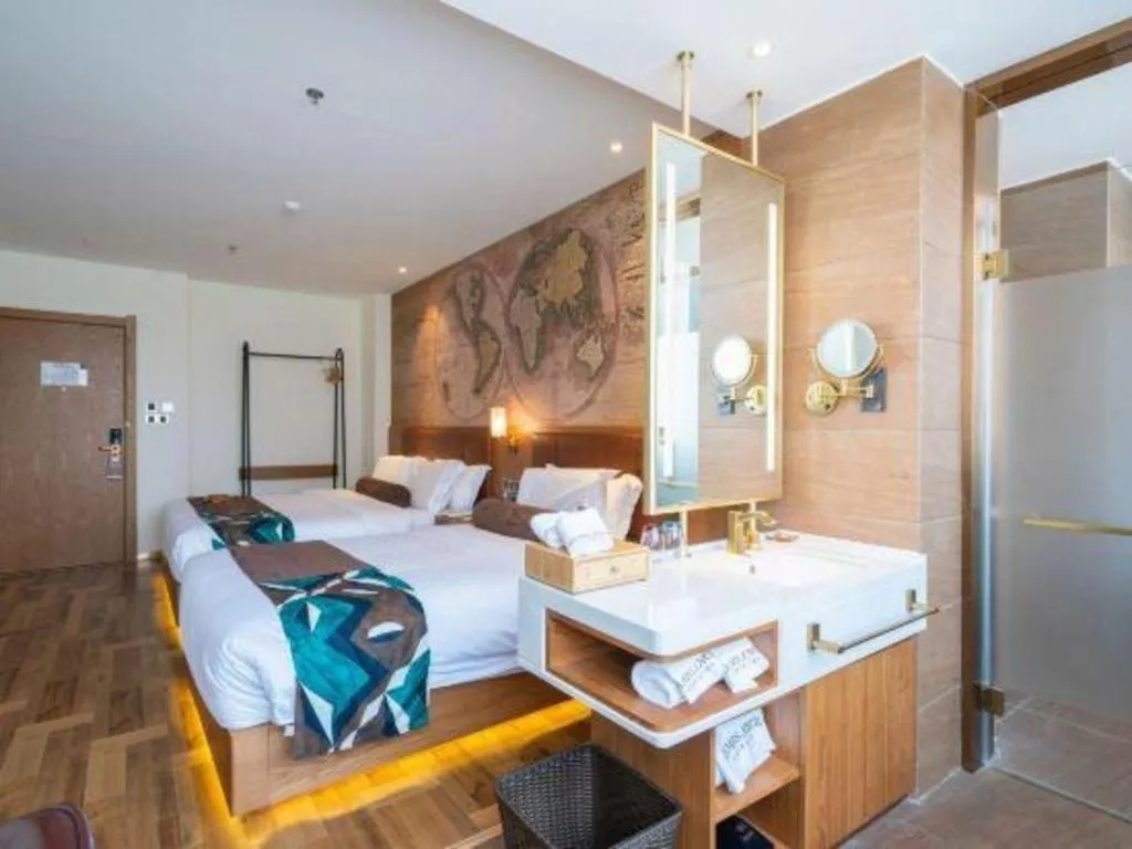 Bed in James Joyce Coffetel Shenyang North Railway Station Qishan Road Metro Station