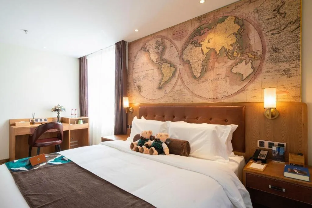 Bed in James Joyce Coffetel Shenyang North Railway Station Qishan Road Metro Station