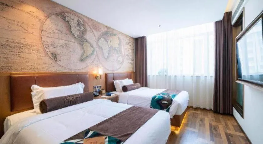 Bed in James Joyce Coffetel Shenyang North Railway Station Qishan Road Metro Station