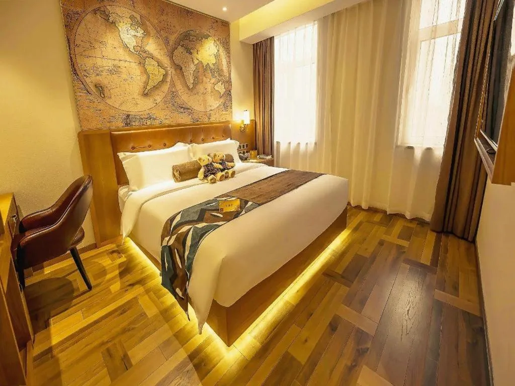 Bed in James Joyce Coffetel Shenyang North Railway Station Qishan Road Metro Station