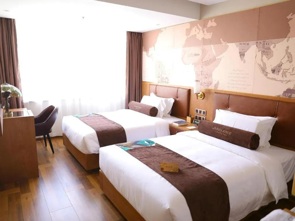 Bed in James Joyce Coffetel Shenyang North Railway Station Qishan Road Metro Station