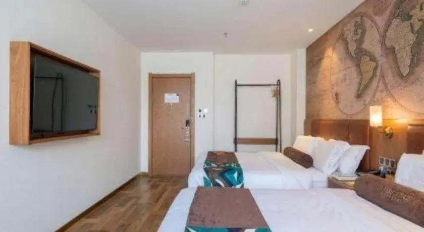 Bed in James Joyce Coffetel Shenyang North Railway Station Qishan Road Metro Station Bed in James Joyce Coffetel Shenyang North Railway Station Qishan Road Metro Station