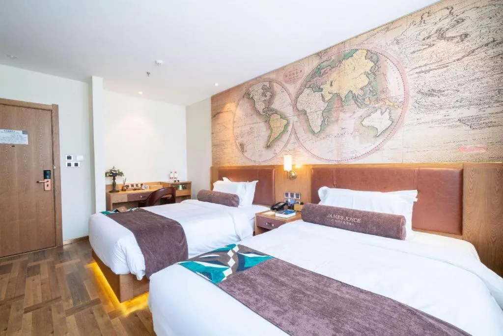 Bed in James Joyce Coffetel Shenyang North Railway Station Qishan Road Metro Station