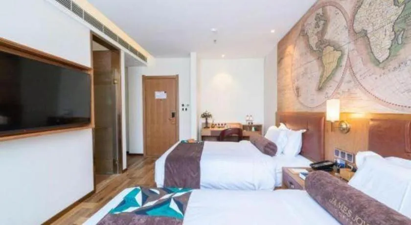 Bed in James Joyce Coffetel Shenyang North Railway Station Qishan Road Metro Station