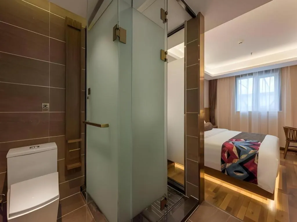 Bed in James Joyce Coffetel Beijing West Railway Station Lianhua Bridge