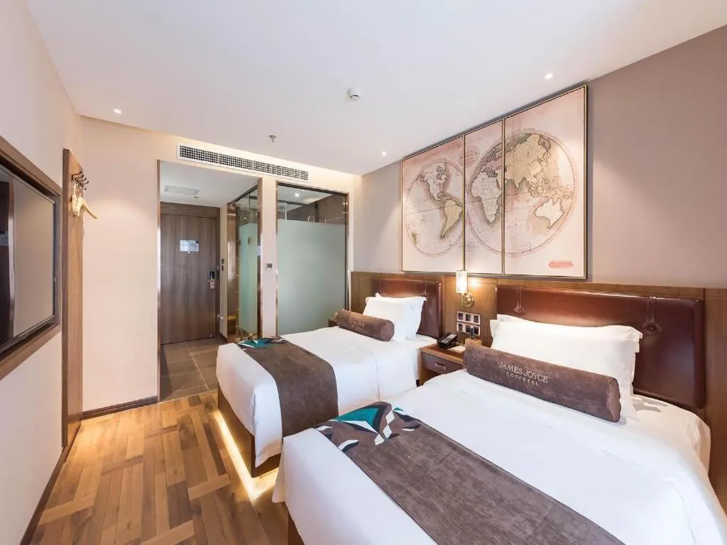 Bed in James Joyce Coffetel Beijing West Railway Station Lianhua Bridge