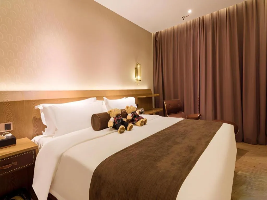 Bed in James Joyce Coffetel Beijing West Railway Station Lianhua Bridge