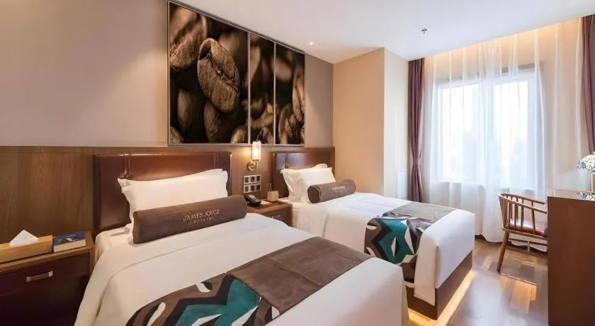 Bed in James Joyce Coffetel Beijing West Railway Station Lianhua Bridge