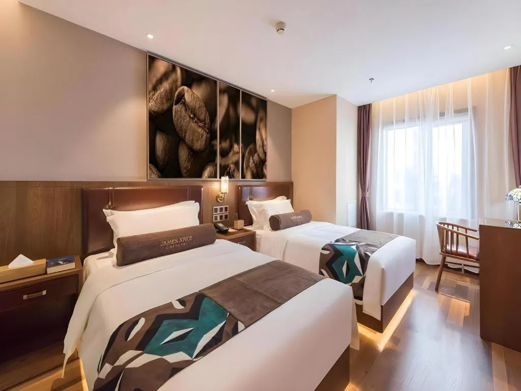 Bed in James Joyce Coffetel Beijing West Railway Station Lianhua Bridge