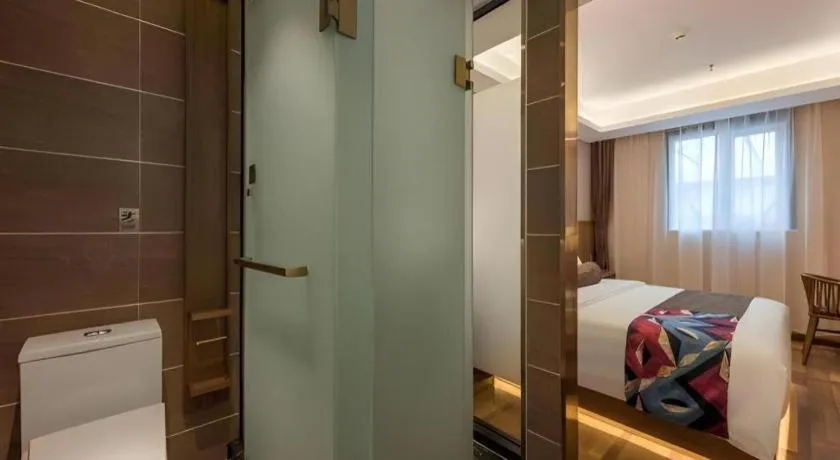 Bed in James Joyce Coffetel Beijing West Railway Station Lianhua Bridge