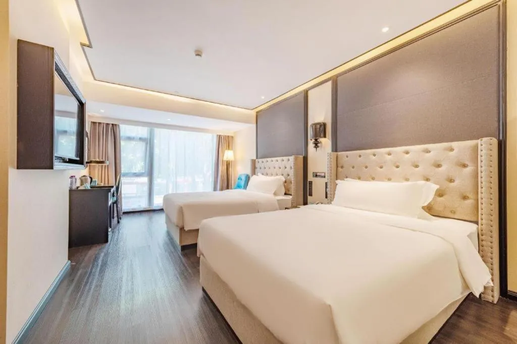 Bed in Xana Hotelle Zhuhai Gongbei Port