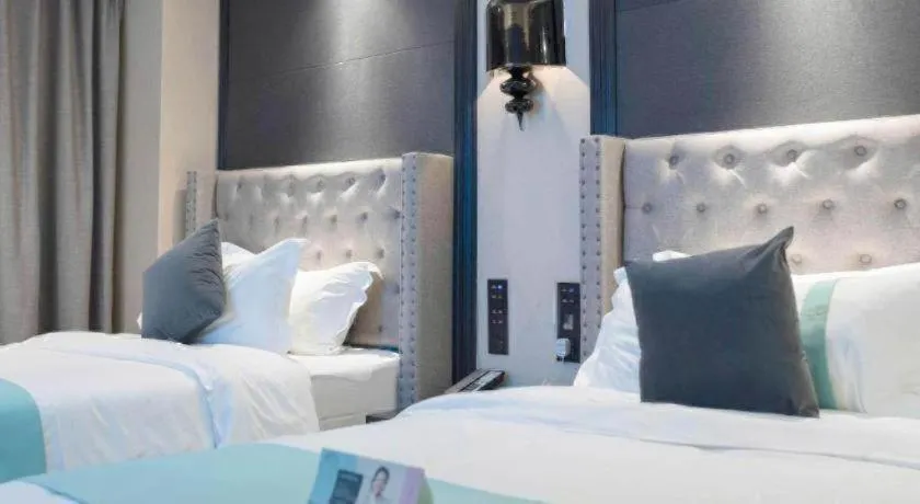 Bed in Xana Hotelle Zhuhai Gongbei Port