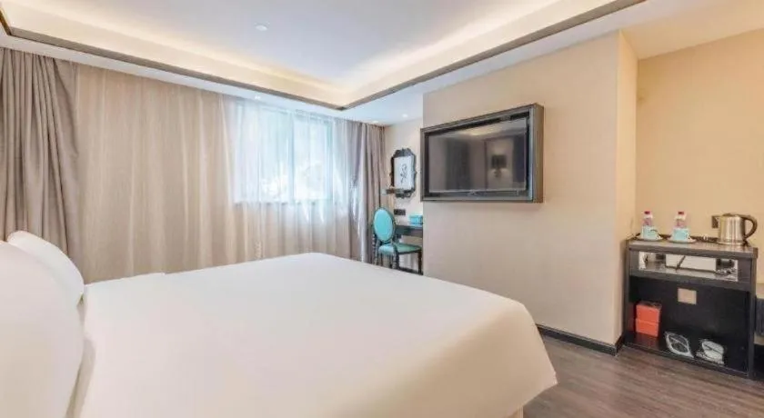 Bed in Xana Hotelle Zhuhai Gongbei Port