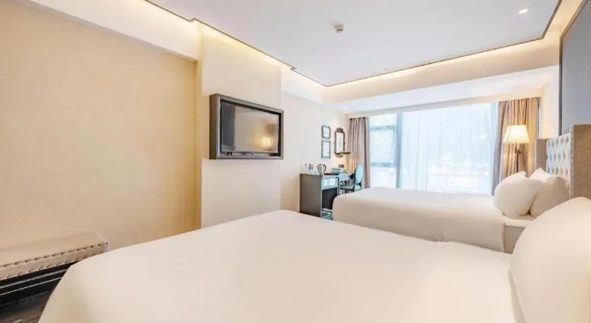 Bed in Xana Hotelle Zhuhai Gongbei Port