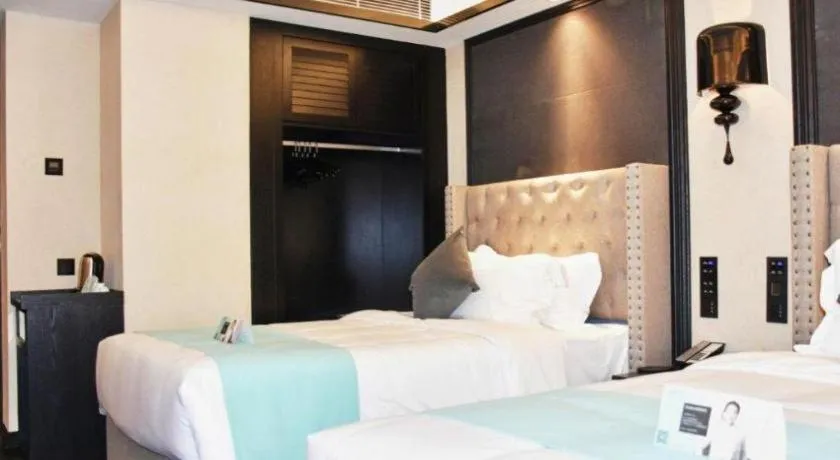 Bed in Xana Hotelle Zhuhai Gongbei Port
