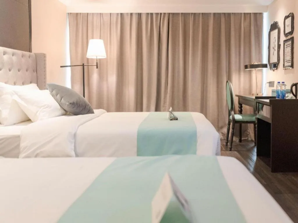 Bed in Xana Hotelle Zhuhai Gongbei Port