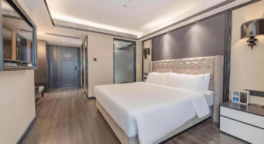 Bed in Xana Hotelle Zhuhai Gongbei Port