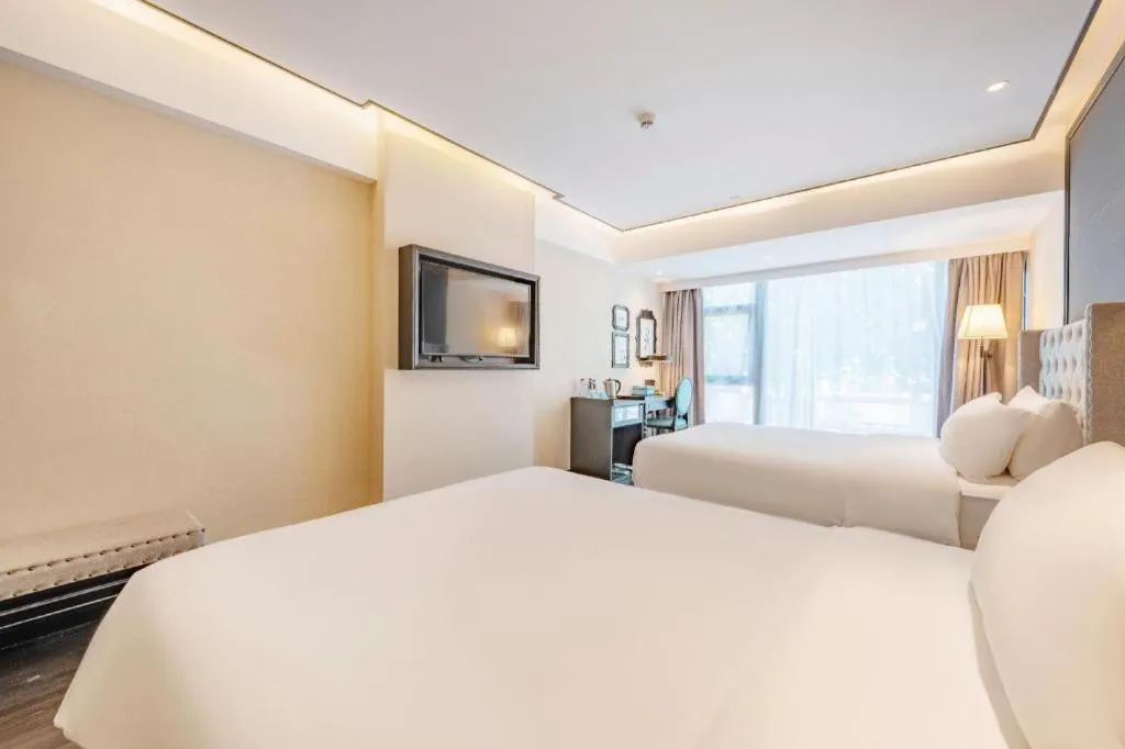 Bed in Xana Hotelle Zhuhai Gongbei Port