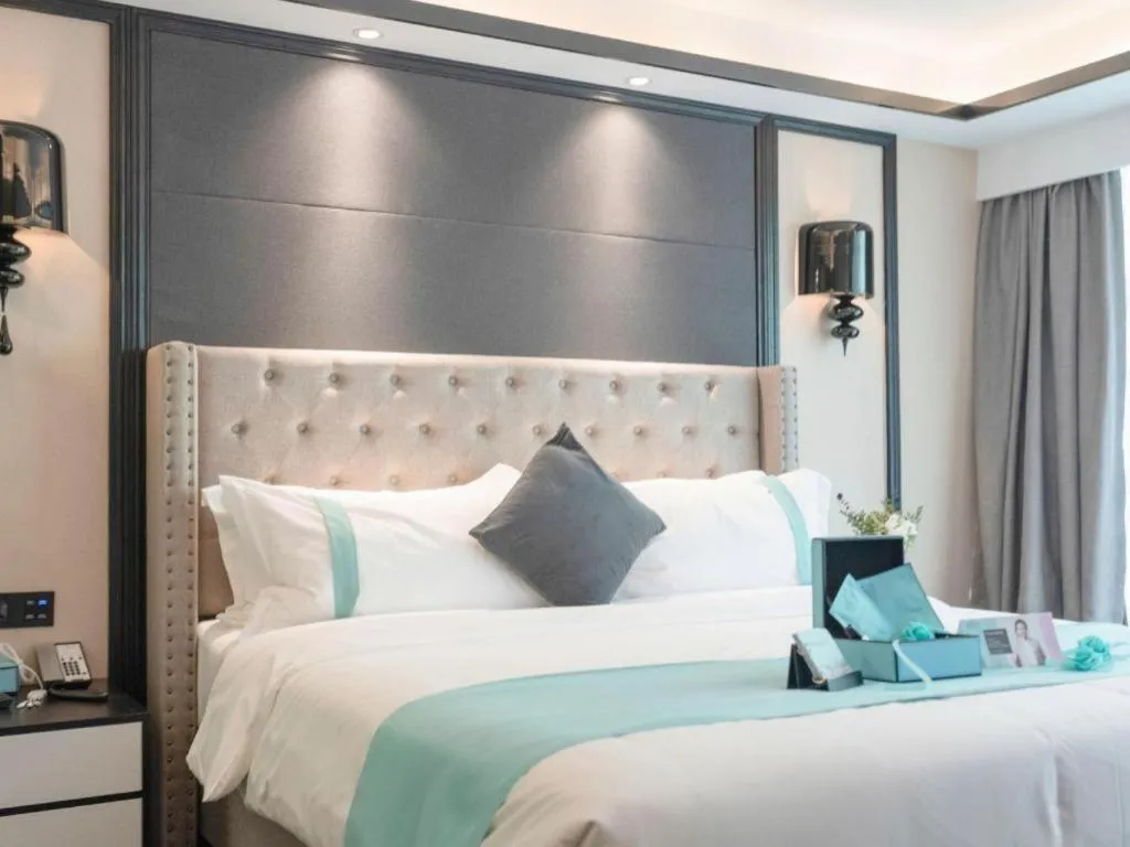 Bed in Xana Hotelle Zhuhai Gongbei Port