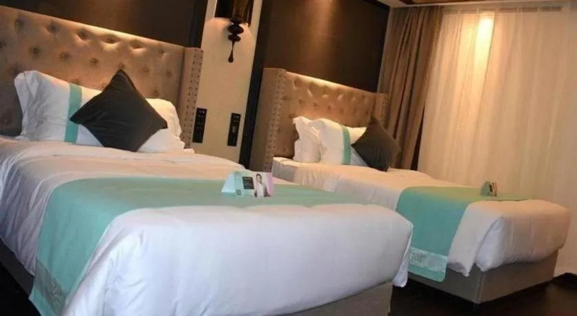 Bed in Xana Hotelle Zhuhai Gongbei Port