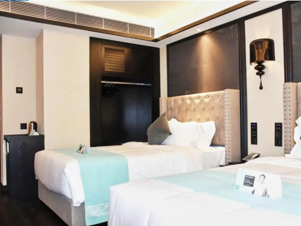 Bed in Xana Hotelle Zhuhai Gongbei Port