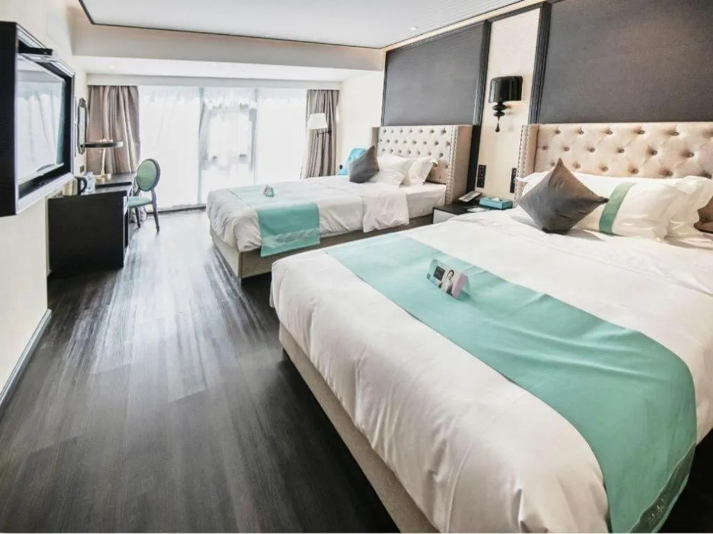 Bed in Xana Hotelle Zhuhai Gongbei Port