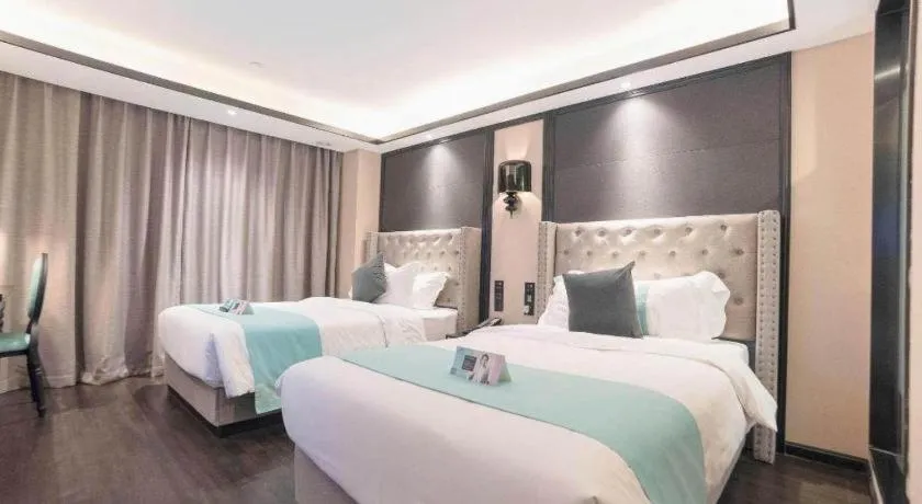 Bed in Xana Hotelle Zhuhai Gongbei Port