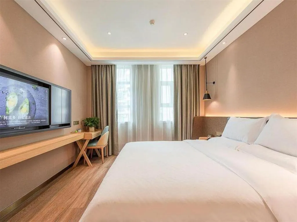 Bed in Zmax Hotel Guangzhou Railway Station