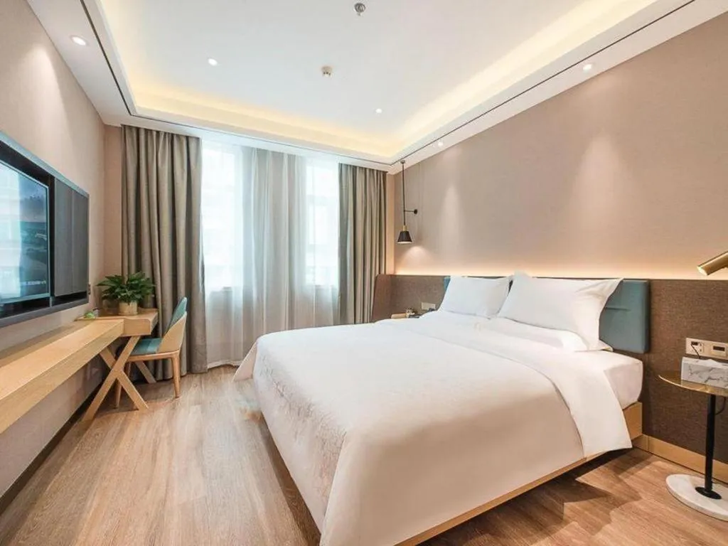 Bed in Zmax Hotel Guangzhou Railway Station