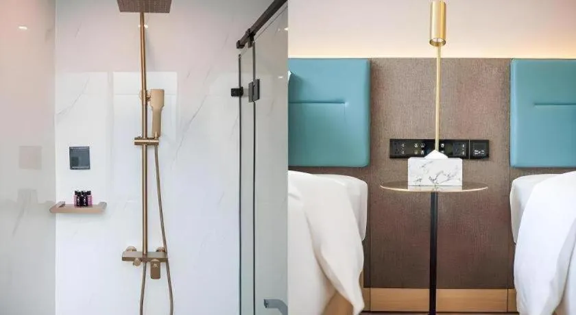 Bed in Zmax Hotel Guangzhou Railway Station