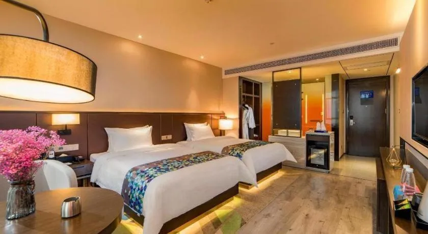 Bed in Zmax Hotel Guangzhou Railway Station