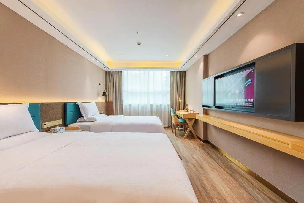 Bed in Zmax Hotel Guangzhou Railway Station