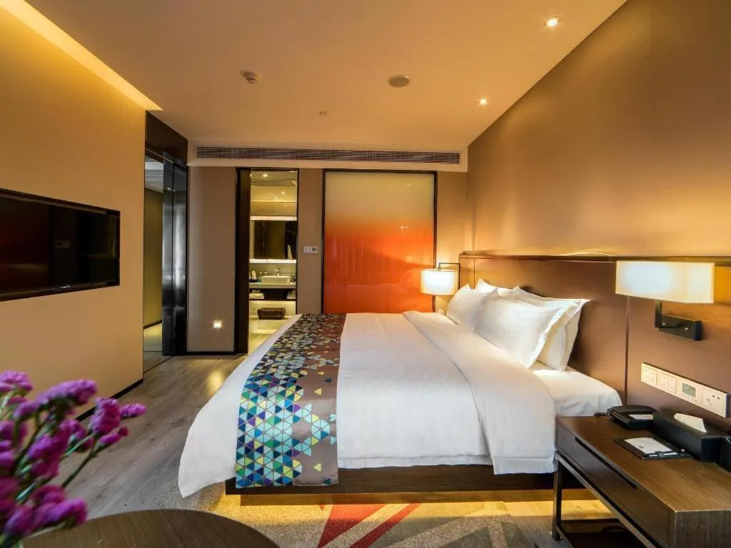 Bed in Zmax Hotel Guangzhou Railway Station