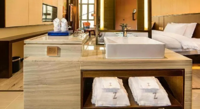 Bed in Zmax Hotel Guangzhou Railway Station